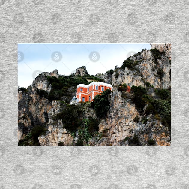 View of a red and white building with lighthouse perching on a cliff in the Amalfi coast by KristinaDrozd